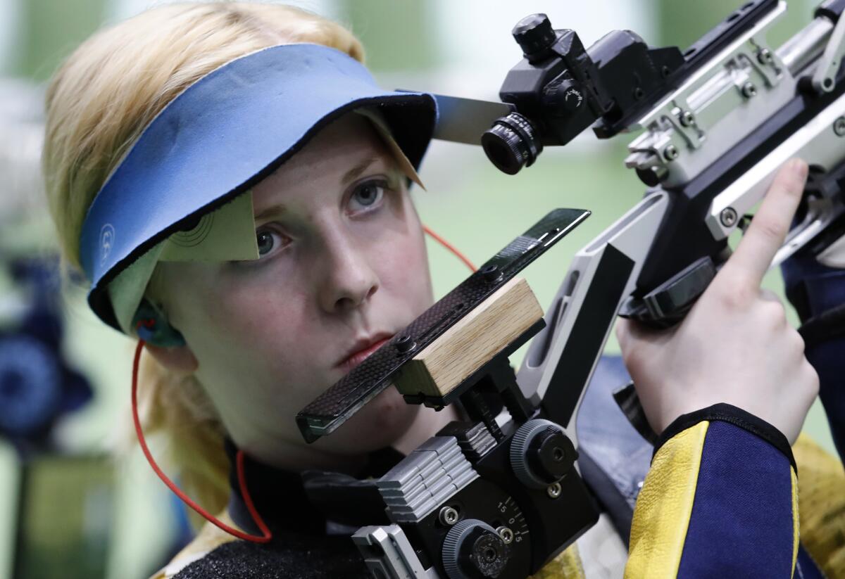 Virginia Thrasher competes in the women's 10-meter air rifle event Saturday.