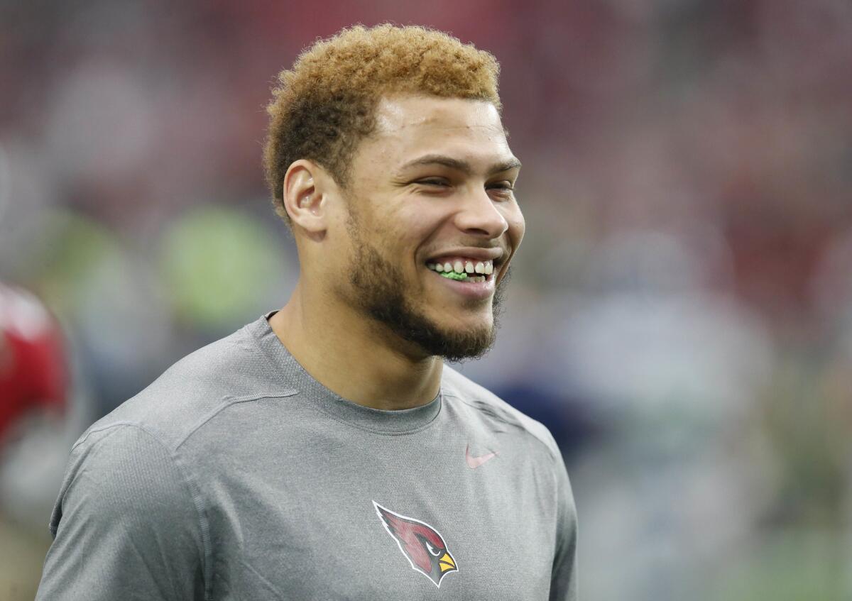 Cardinals free safety Tyrann Mathieu watches warm ups prior to a game against the Seahawks on Jan. 3.