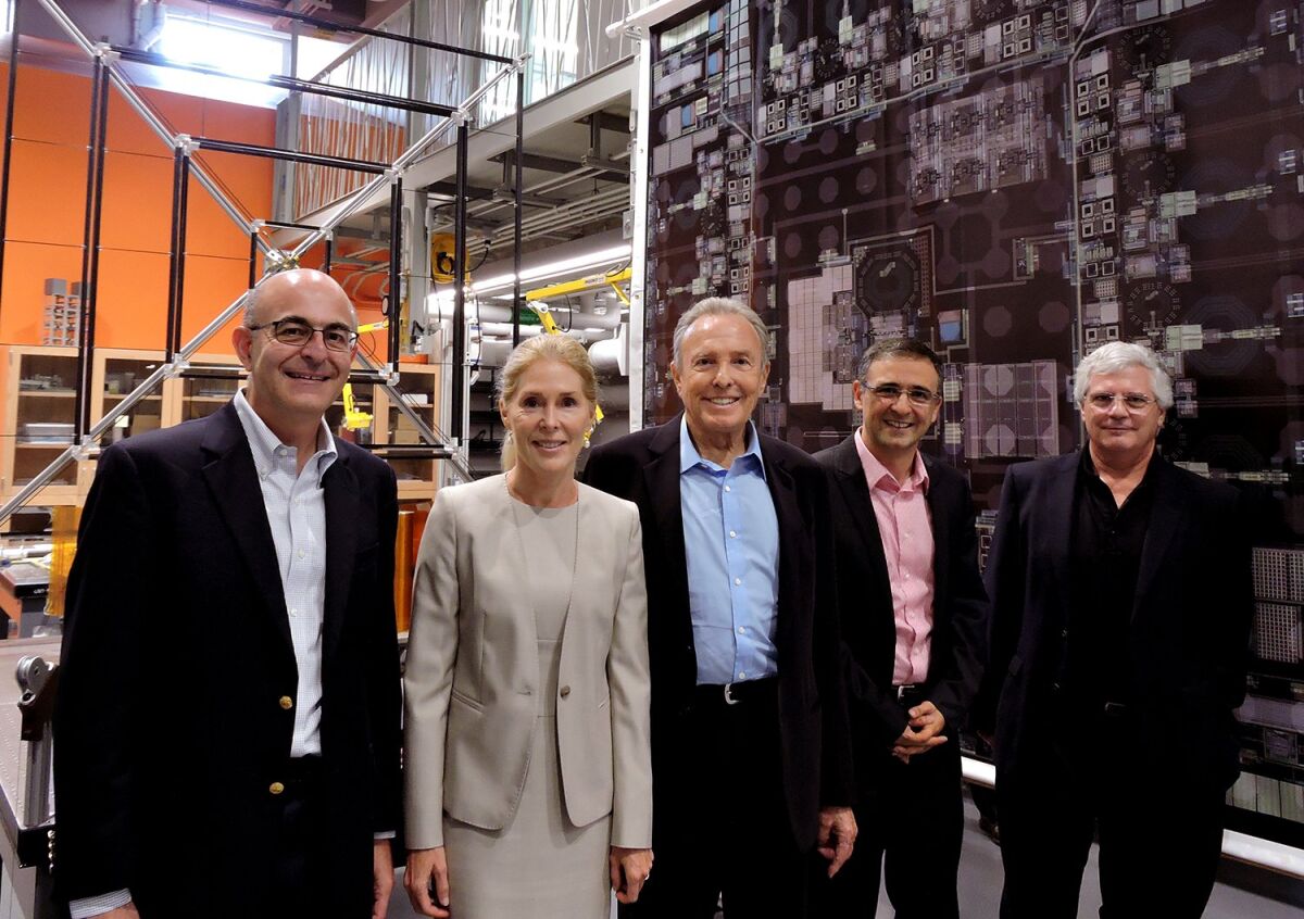 Brigitte and Donald Bren, second and third from left, with members of Caltech's Space Solar Power Project.