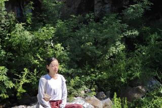 Hebei, China-July 2024-Guanye Youth Nursing Home is in the rural mountains near the Yesanpo National Park, a three hour drive from Beijing, China. Volunteer meditating outside. (Guo Lu Wang / For the Times)