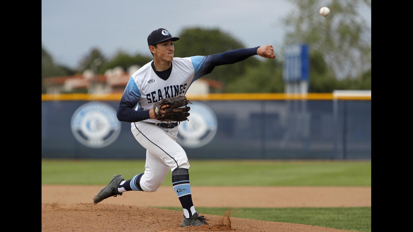 Corona del Mar High starter Chazz Martinez pitches during the first inning against Beckman in a Pacific Coast League opener in Newport Beach on Friday, March 16.