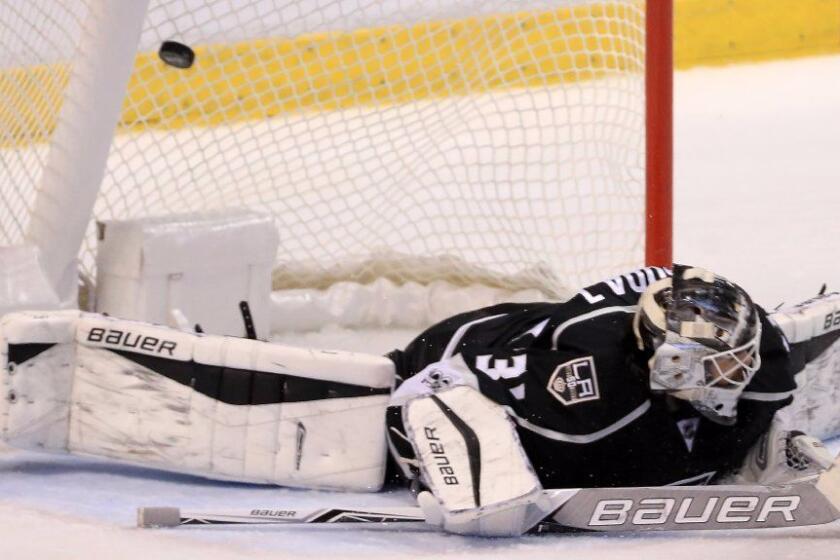 Kings goaltender Peter Budaj gives up a goal during a game against the Florida Panthers on Feb. 9.