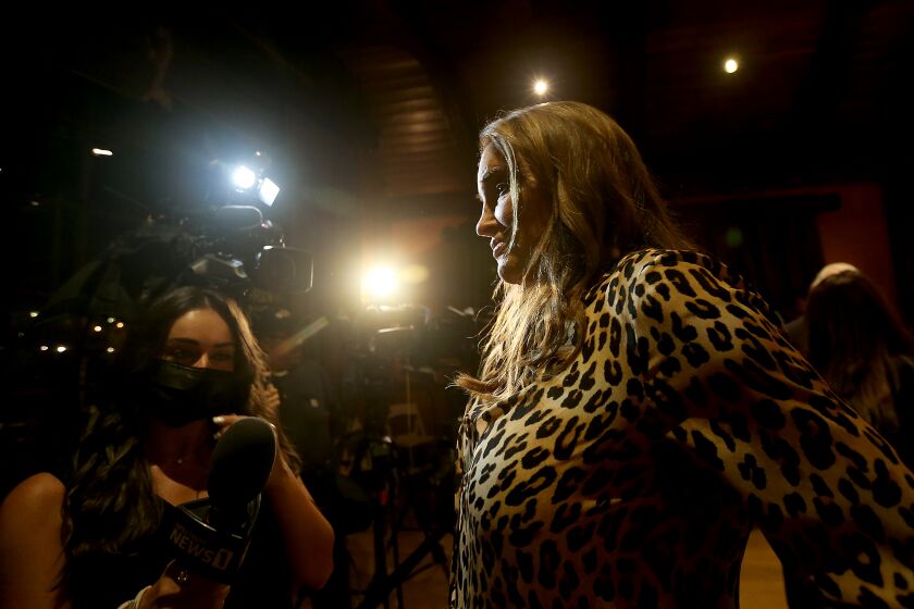 THOUSAND OAKS, CALIF. - SEP 14, 2021. Gubernatorial recall candidate Caitlyn Jenner meets with members of the press to concede defeat during a recall election night gathering of supporters in Thousand Oaks on Tuesday, Sept. 14, 2021. (Luis Sinco / Los Angeles Times)