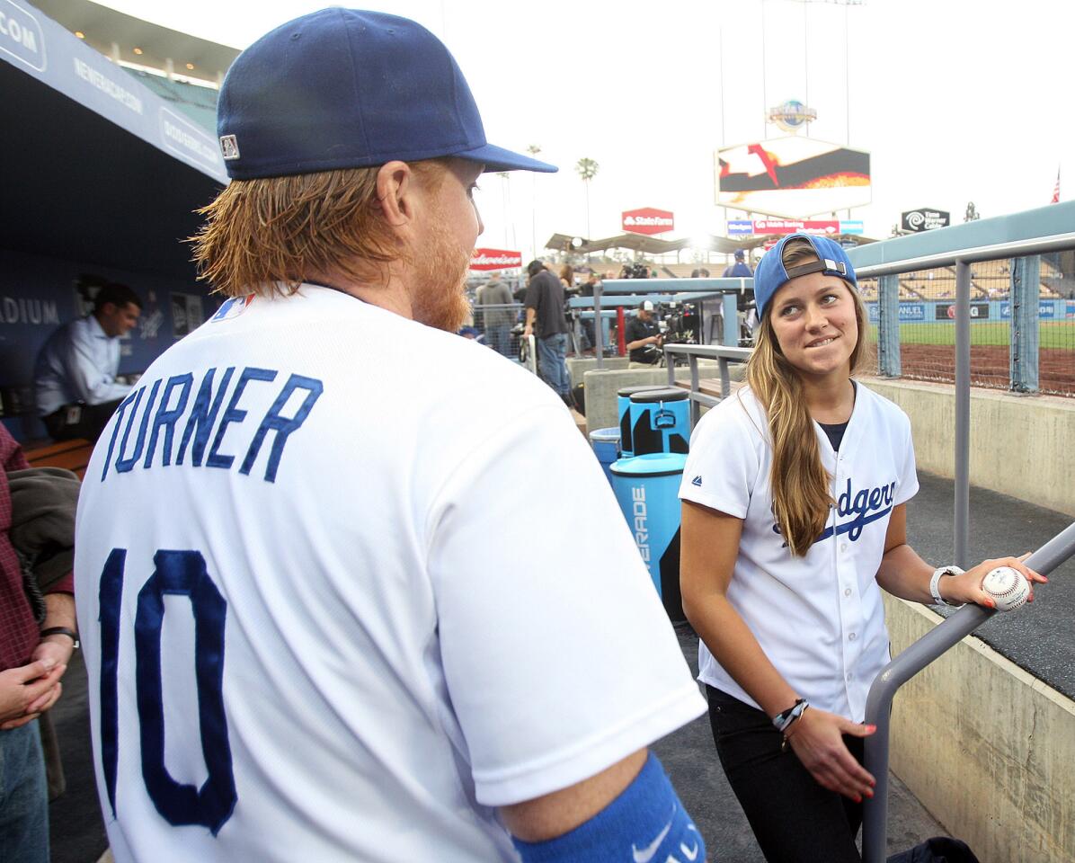 Photo Gallery: Olympian Kate Hansen throws out first pitch of Dodger game