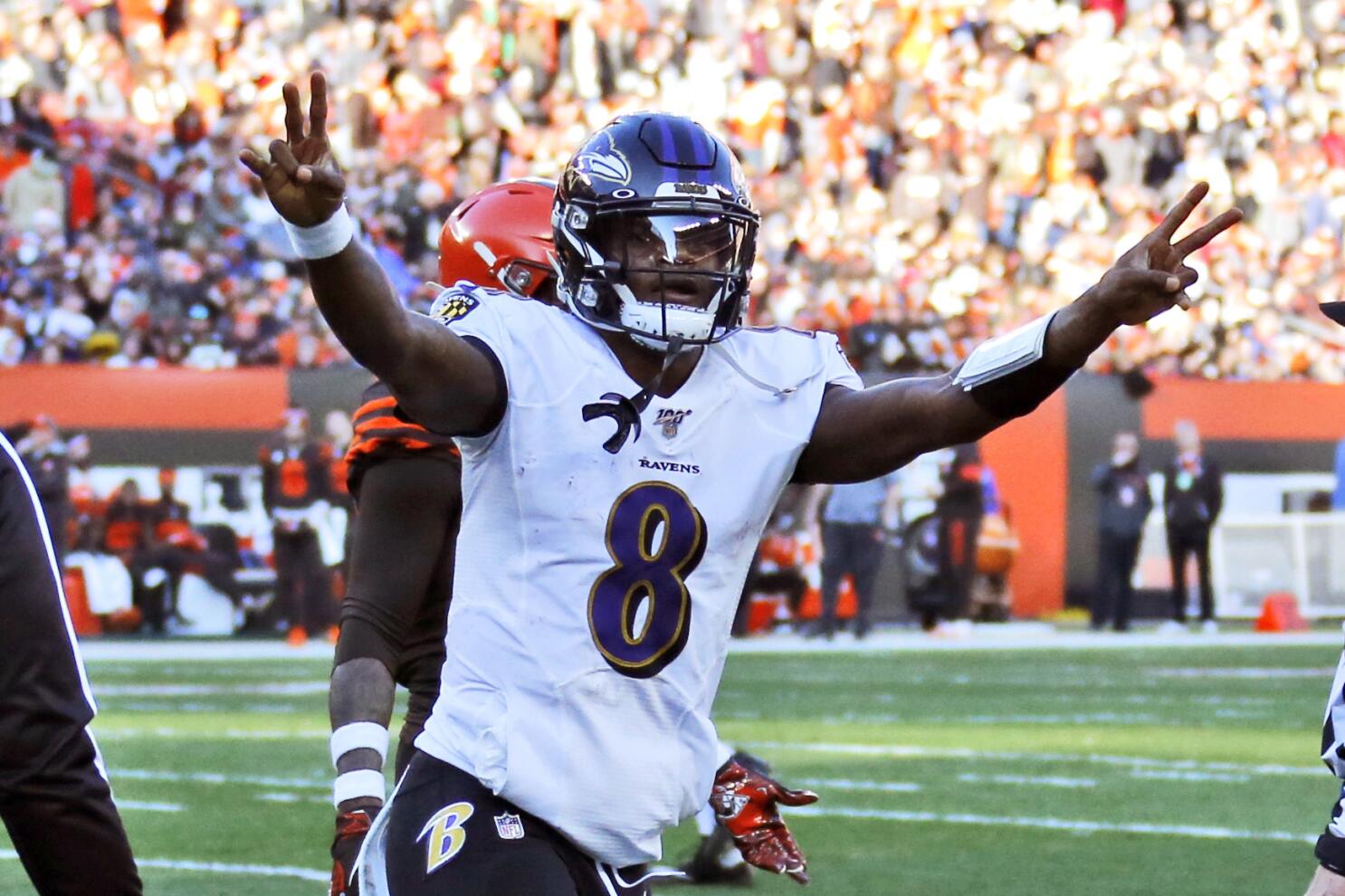 Ravens win 11th straight, clinch top seed in AFC playoffs