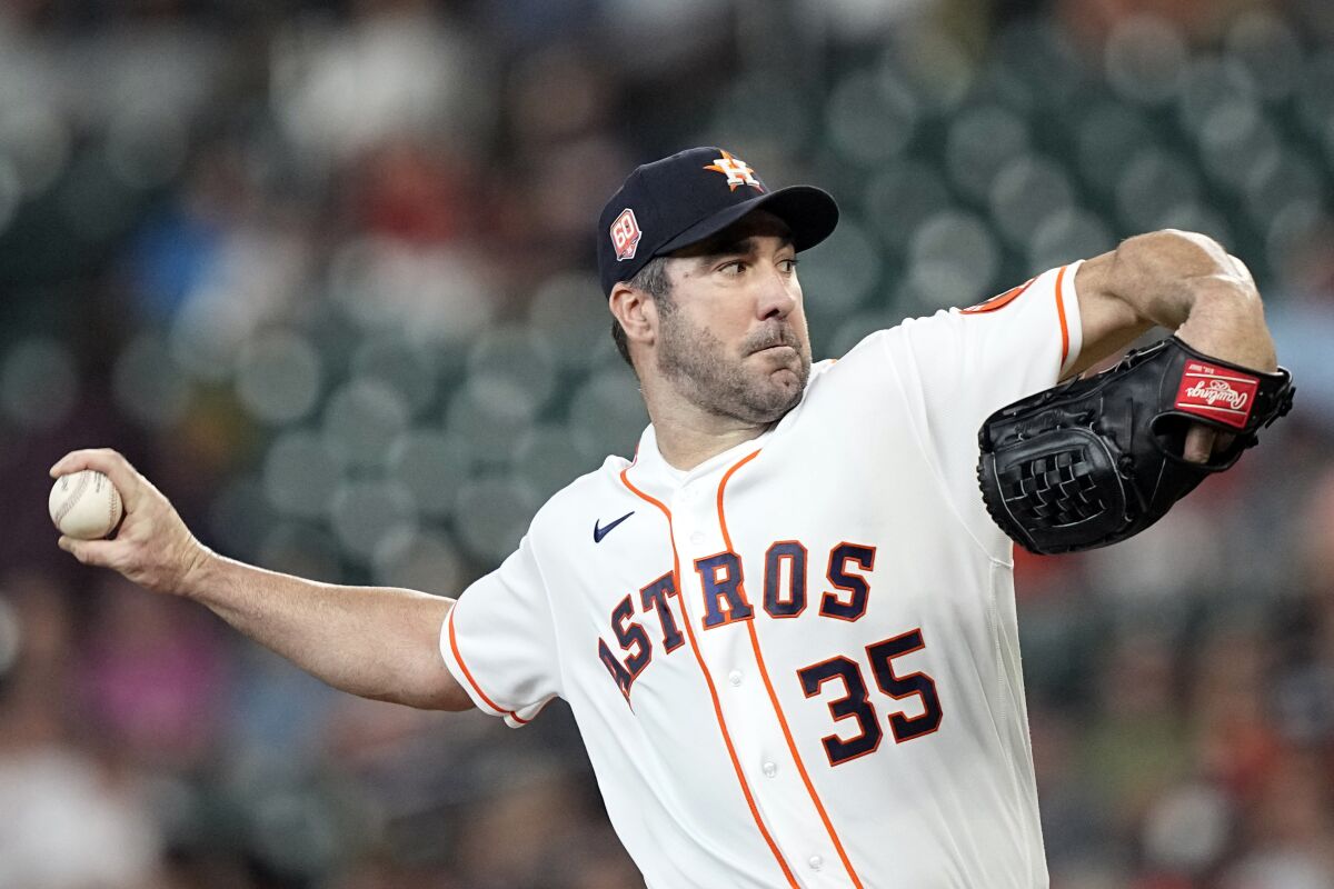 Houston Astros starting pitcher Justin Verlander throws against the Seattle Mariners during the first inning of a baseball game Tuesday, June 7, 2022, in Houston. (AP Photo/David J. Phillip)