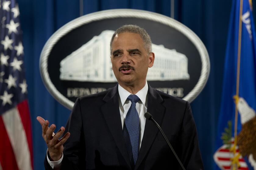 Atty. Gen. Eric Holder speaks at the Justice Department in Washington last week.