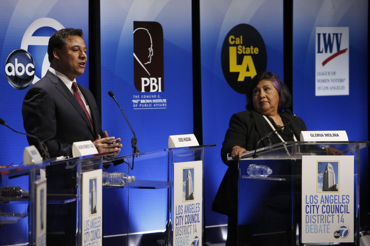 Los Angeles City Councilman Jose Huizar debates former L.A. County Supervisor Gloria Molina, one of his opponents for City Council District 14.