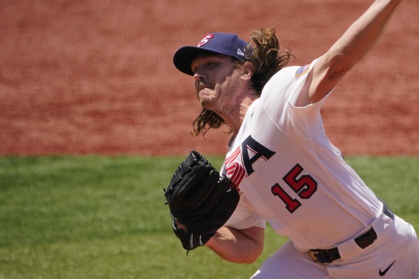 United States' Scott Kazmir pitches in the second inning of a baseball game.