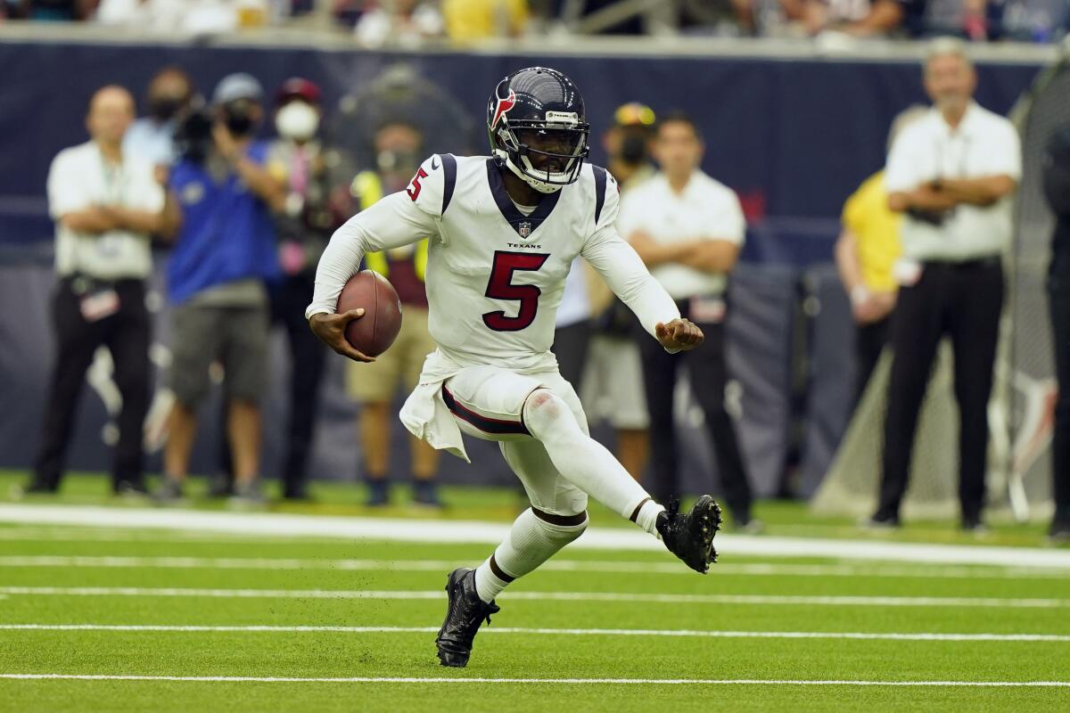 Houston Texans quarterback Tyrod Taylor carries the ball against the Jacksonville Jaguars on Sunday.