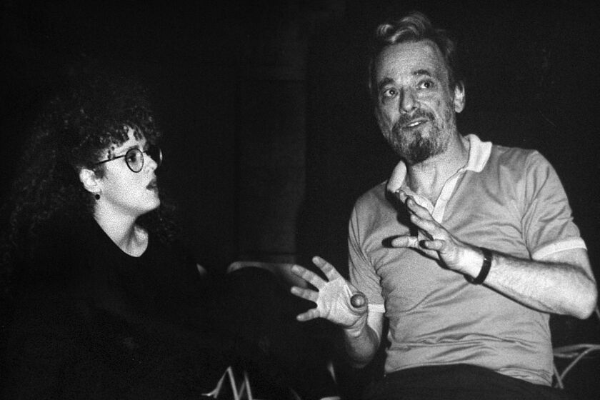 Bernadette Peters and Stephen Sondheim confer during the November 1987 recording of the original Broadway cast album of "Into the Woods." The composer and star will reunite for a Nov. 9 celebration of the musical at Segerstrom Hall in Costa Mesa.