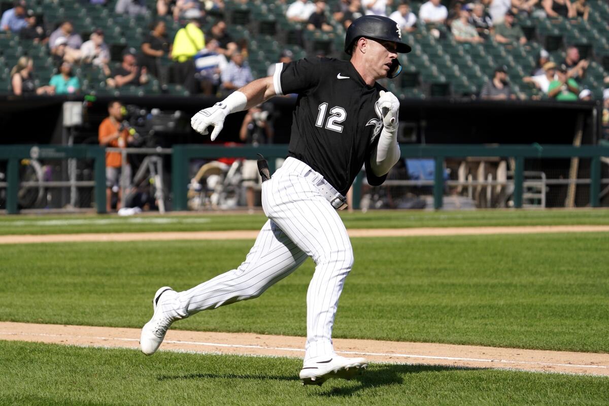 Chicago White Sox's Romy Gonzalez sprints to first after hitting a RBI single in the sixth inning of a baseball game against the Kansas City Royals in Chicago, Thursday, Sept. 1, 2022. AJ Pollock scored on the hit. (AP Photo/Nam Y. Huh)