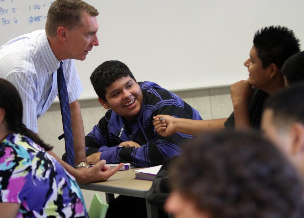 L.A. schools Supt. John Deasy, shown with students, praised Gov. Jerry Brown's budget for schools but said funding still hasn't caught up to what it was in 2008, when the state budget crisis officially began.