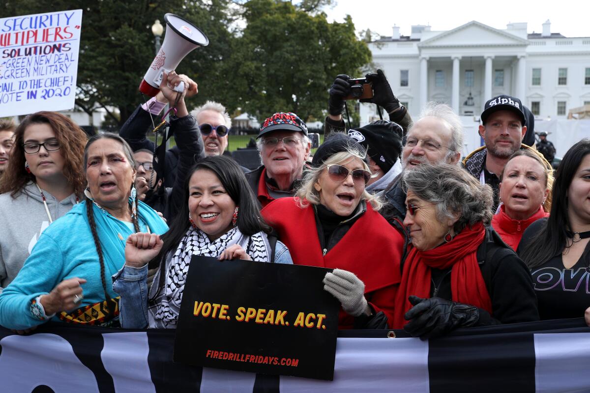 Actor Jane Fonda rallies with dozens of others at the White House in 2019 as part of her "Fire Drill Fridays."