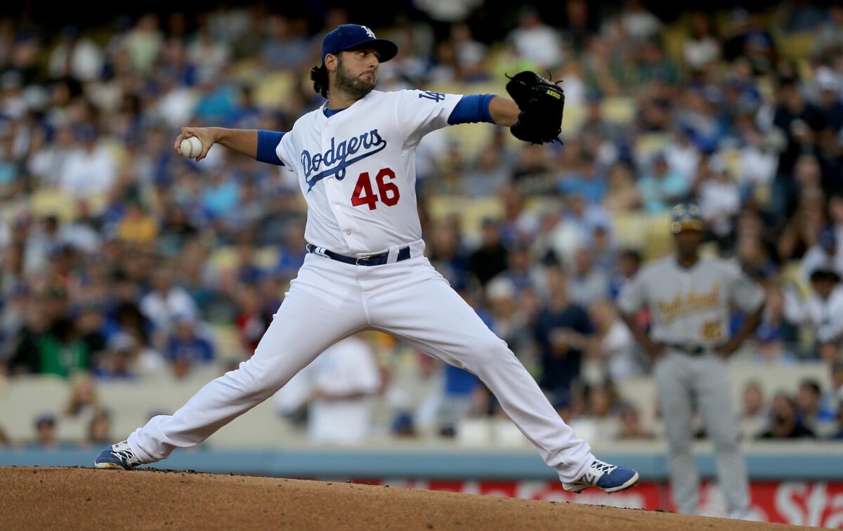 Dodgers starter Mike Bolsinger delivers a pitch against the Athletics in the first inning of his last start on July 29.