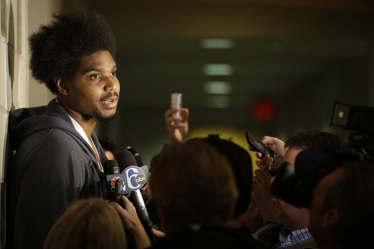 Philadelphia 76ers center Andrew Bynum speaks to reporters at the team's training facility.
