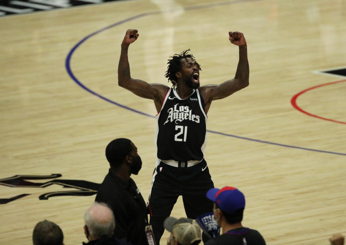 Clippers guard Patrick Beverley reacts after making a three-pointer against the Jazz.