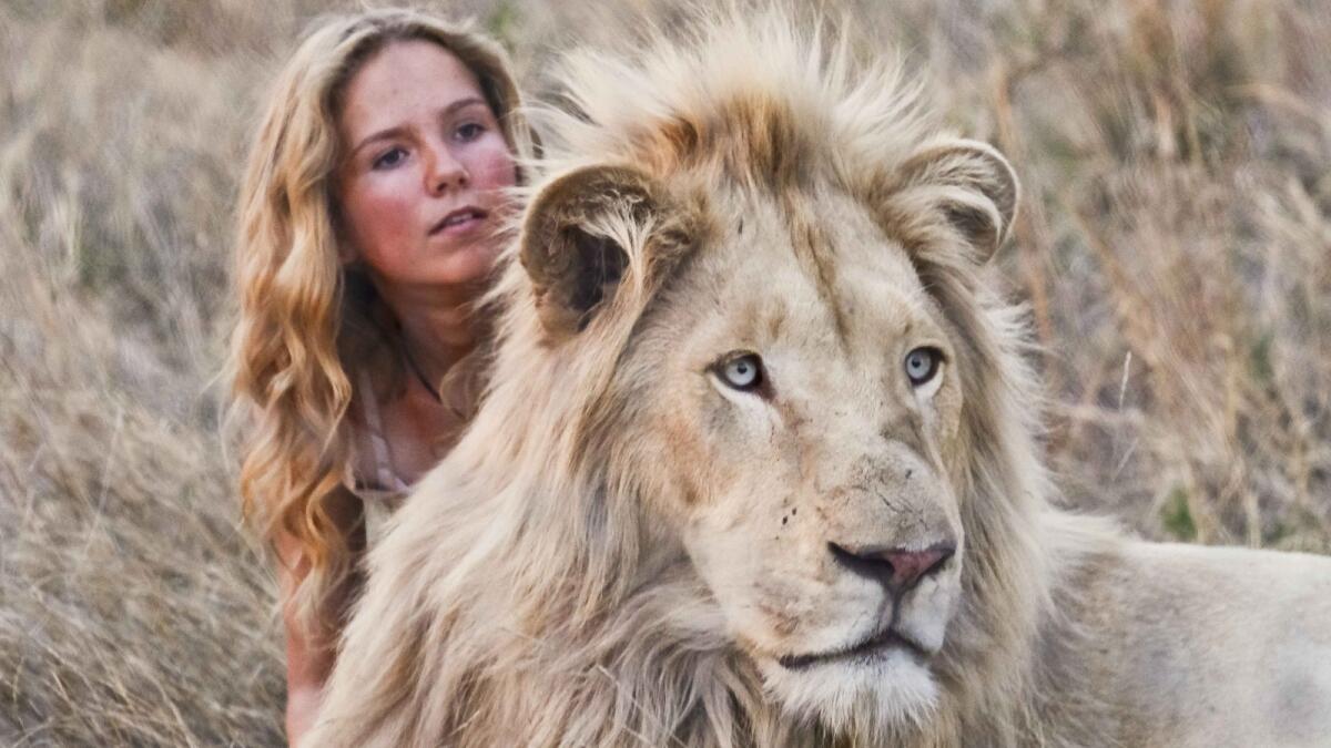 Daniah de Villiers with Thor in the movie "Mia and the White Lion."