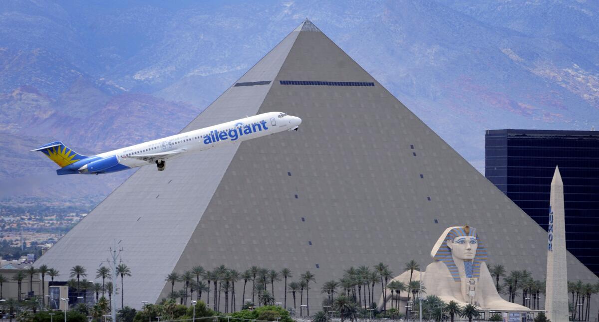 An Allegiant jetliner takes off from McCarran International Airport in Las Vegas earlier this year. A computer outage was blamed for delays at the airline on Friday.