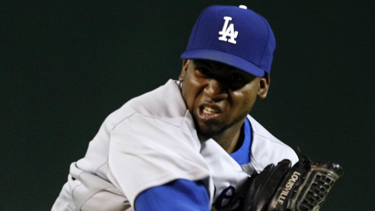 Dodgers reliever Pedro Baez throws against the Arizona Diamondbacks on Aug. 26.