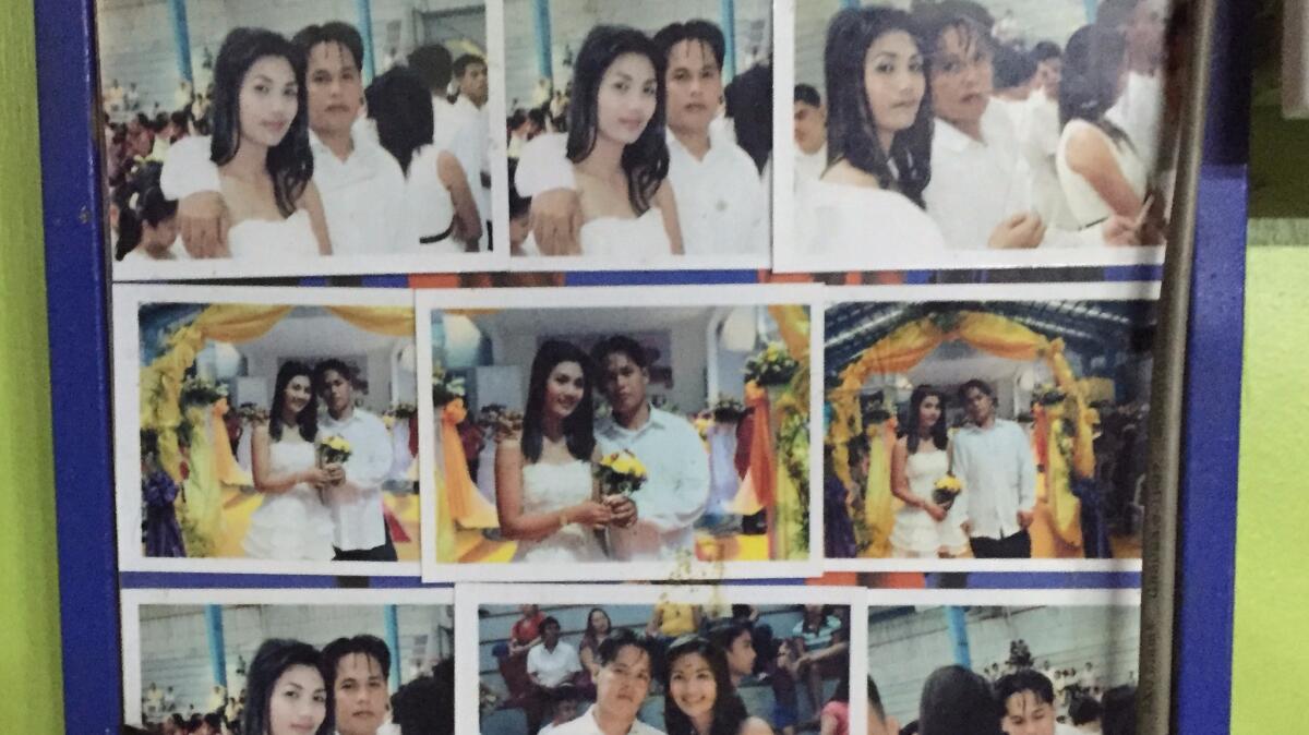 Pictures from Sheila Rivera's and Letlet Belmonte's wedding in 2013 hang on the wall of her living room.