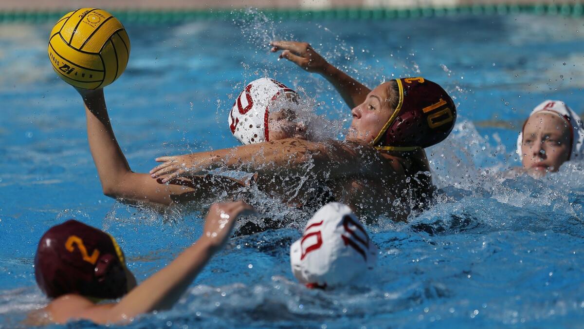 USC's Alejandra Azna pressures Stanford's Ryann Neushul during the second half of the NCAA championship game Sunday in Palo Alto.