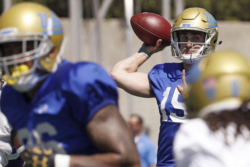 LOS ANGELES, CALIF. - APR. 21, 2018. UCLA quarterback Matt Lynch (15) throws downfield during the Bruins' spring football game at Drake Stadium on Saturday, April 21, 2018.Luis Sinco/Los Angeles Times)
