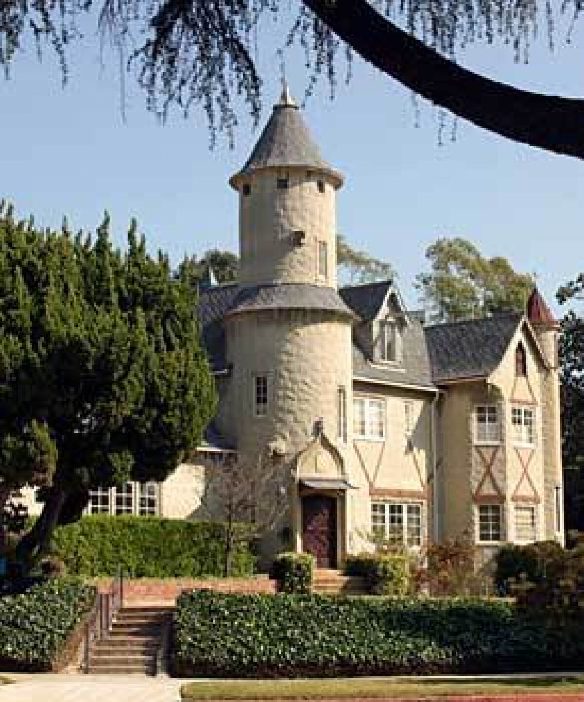 This castle-style house is a standout among the 400 homes in the 1920s neighborhood of Brookside.