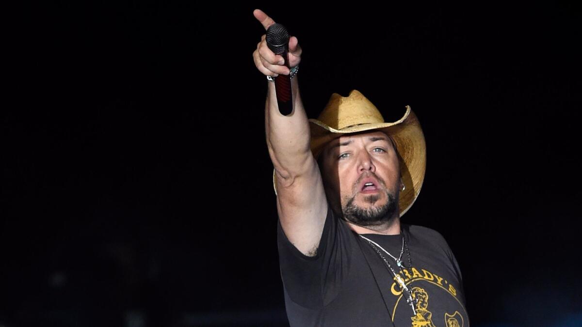 Jason Aldean on stage just before a gunman opened fire on the Route 91 Harvest country music festival, a key event in making Las Vegas a major destination for outdoor music.