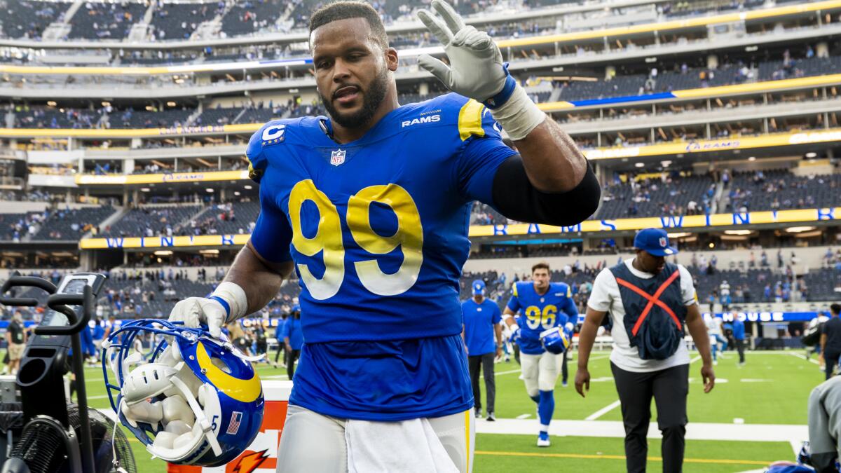 Los Angeles Rams defensive end Aaron Donald (99) celebrates during the  first half of an NFL wild-card playoff football game against the Arizona  Cardinals in Inglewood, Calif., Monday, Jan. 17, 2022. (AP