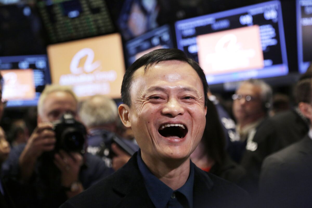 Alibaba founder Jack Ma is all smiles during the company's IPO at the New York Stock Exchange in September.