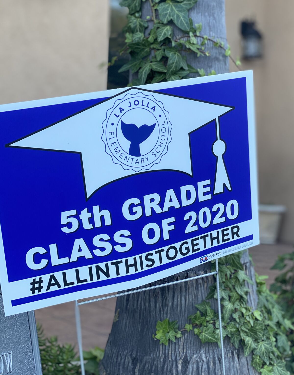 Fifth-graders at La Jolla Elementary received yard signs to soothe the sting of not having in-person promotion ceremonies.