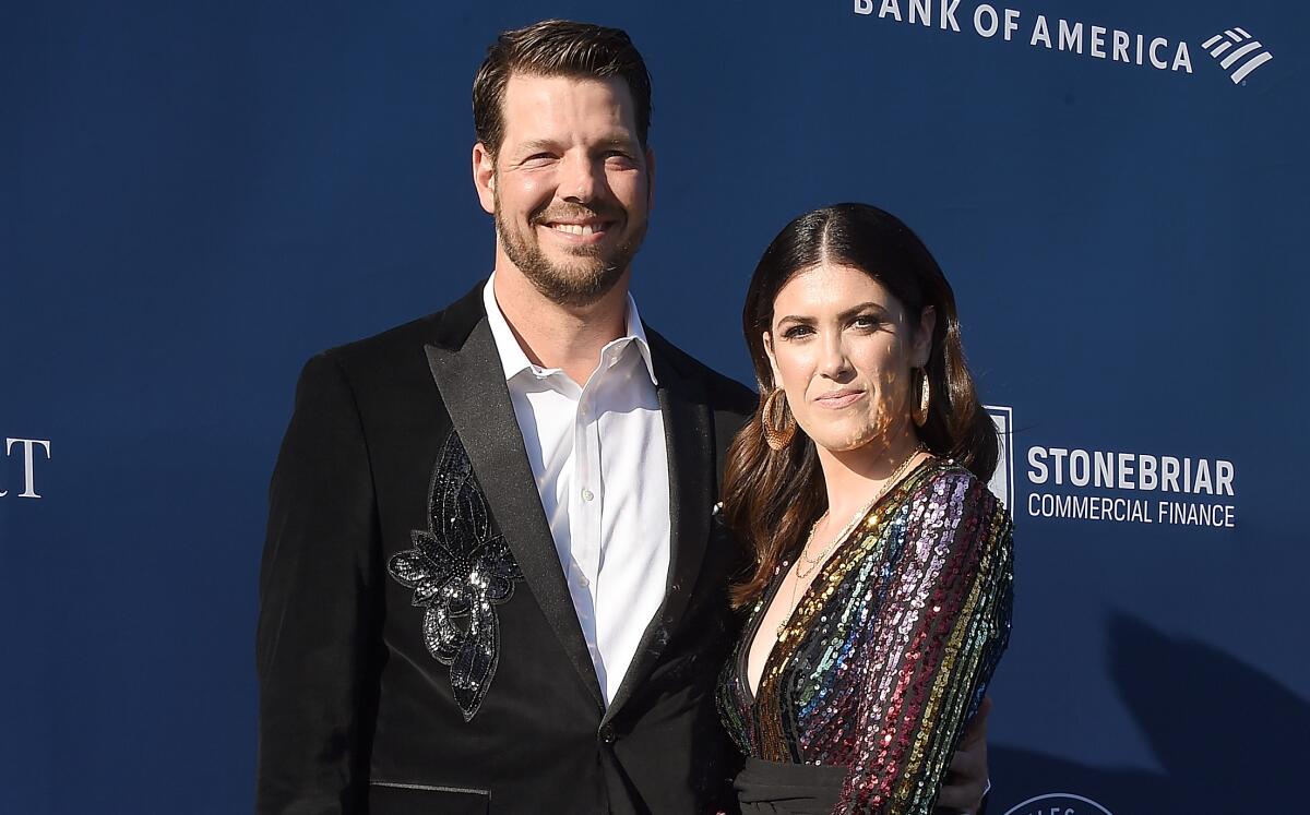 Rich Hill and his wife, Caitlin, arrive at an event at Dodger Stadium on June 12.