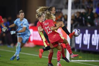 Angel City's Claire Emslie scores in the 76th minute of a 2-2 draw with Portland at BMO Stadium.