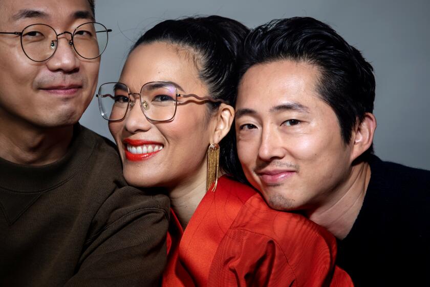 WEST HOLLYWOOD-CA-MARCH 29, 2023: 'Beef' creator Lee Sung Jin, left, with actors Ali Wong, center, and Steven Yeun, right, are photographed at The London Hotel in West Hollywood on March 29, 2023. (Christina House / Los Angeles Times)