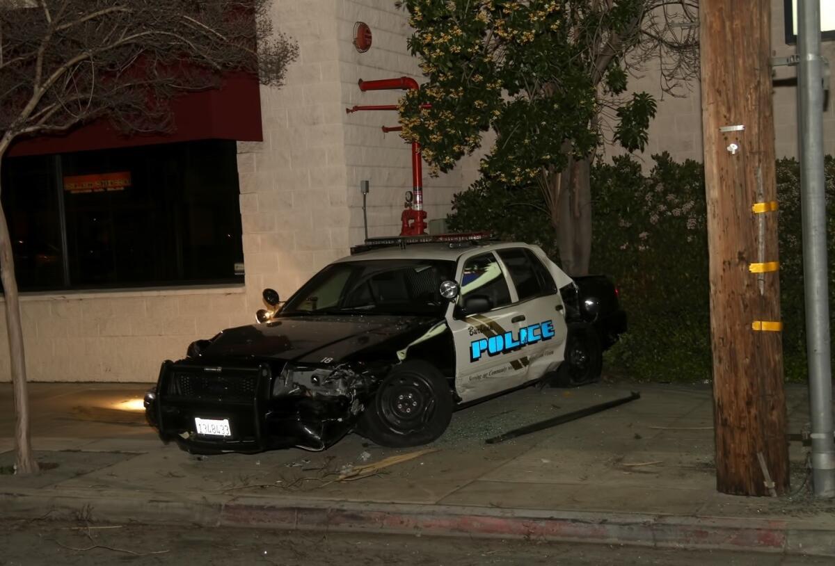 A police car and another vehicle collided in Burbank Friday night.