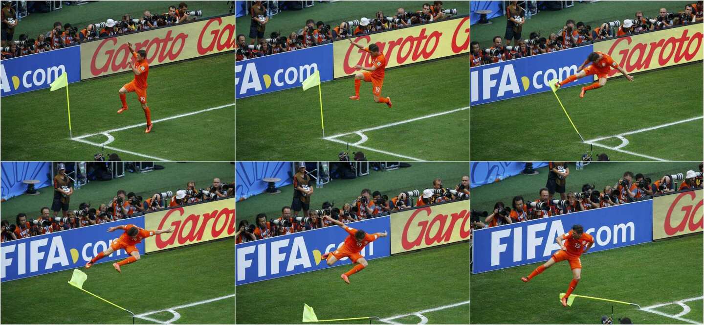 Combination photo of Huntelaar of the Netherlands kicking the corner flag as he celebrates after scoring a penalty against Mexico during their 2014 World Cup round of 16 game at the Castelao arena in Fortaleza
