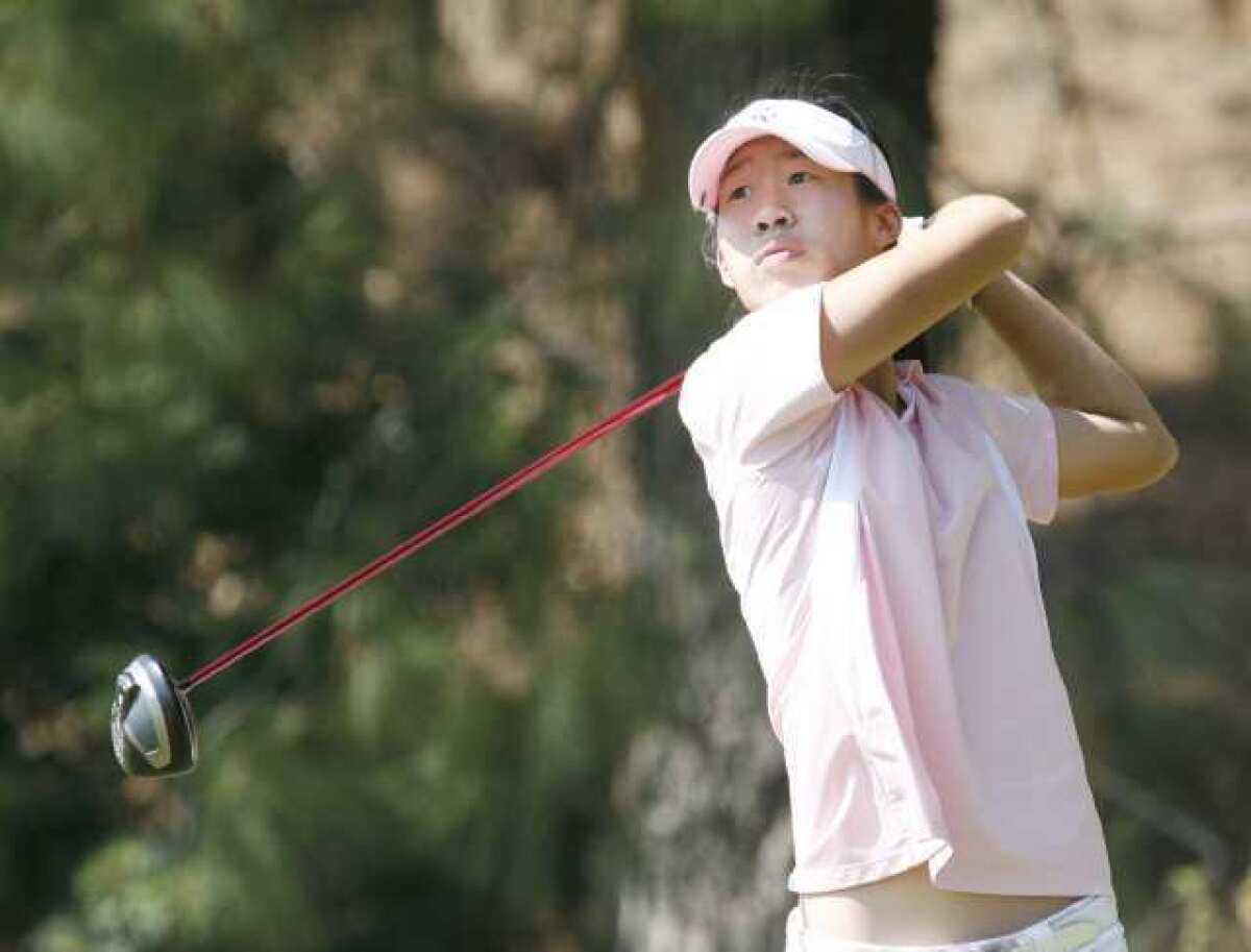 Crescenta Valley's Jocelyn Chia tees off on the third at La Canada Country Club for the CIF girls golf prelims.