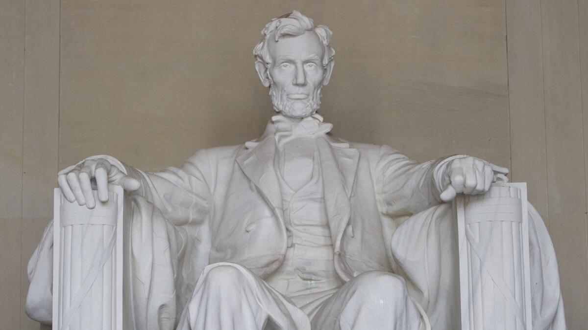 The words of Lincoln's second inaugural address are inscribed on a wall near the statue of the president at the Lincoln Memorial in Washington, D.C.