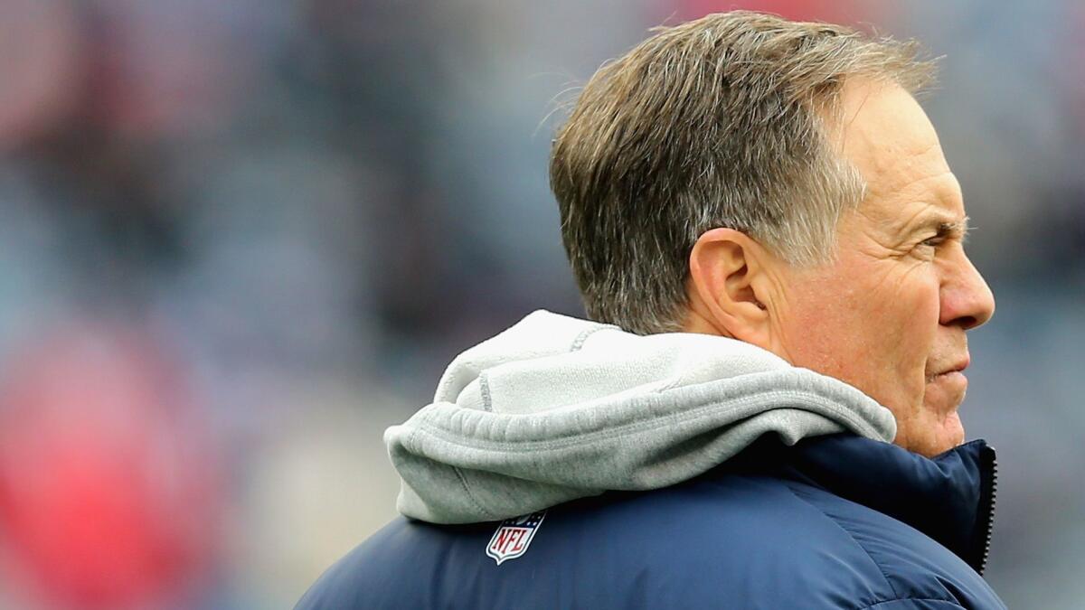 Bill Belichick coaches the New England Patriots against the Buffalo Bills on Dec. 24.