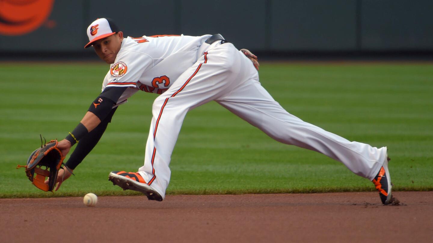 Orioles third baseman Manny Machado won his first Gold Glove award in 2013, beating out the Tampa Bay Rays' Evan Longoria and the Texas Rangers' Adrian Beltre. He won again in 2015, edging the same players.