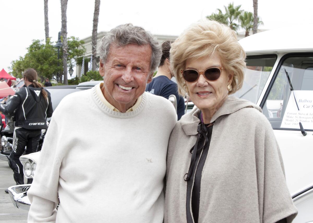 Richard and Donna Pickup attend the Father's Day Car Show held at the Balboa Bay Club in 2021. 