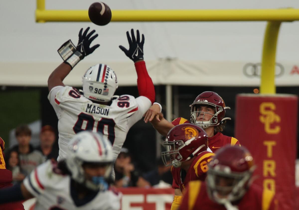 USC quarterback Jaxson Dart throws downfield against Arizona.