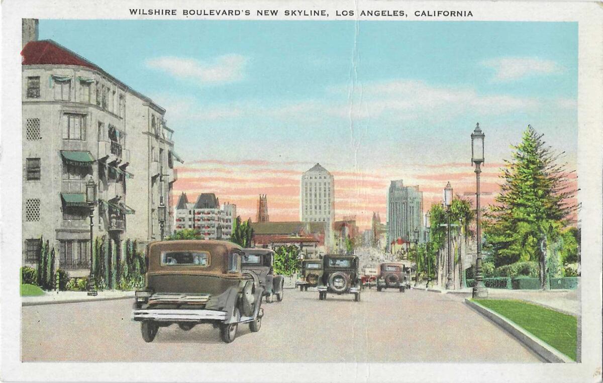 A vintage postcard shows tall buildings at sunset and reads "Wilshire Boulevard's New Skyline, Los Angeles, California"