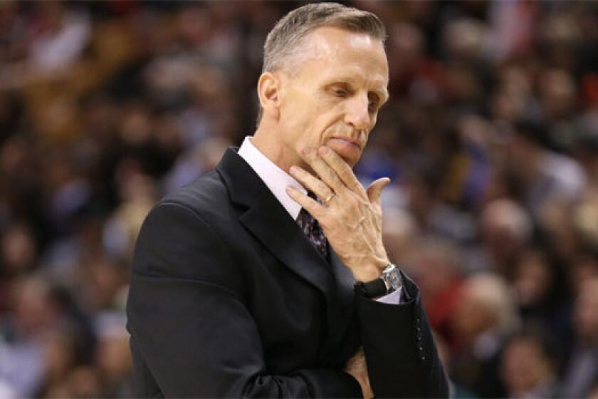 Mike Dunlap, shown coaching the Charlotte Bobcats in 2013, is the new coach at Loyola Marymount.