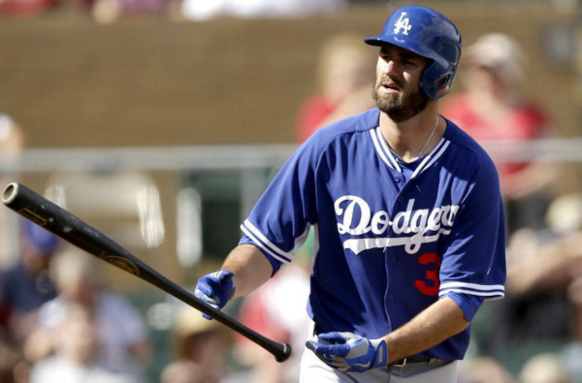 Scott Van Slyke, heading to first base after drawing a walk in an exhibition game, is likely to start in left field for the Dodgers when they open the regular season against the Diamondbacks in Australia next week.