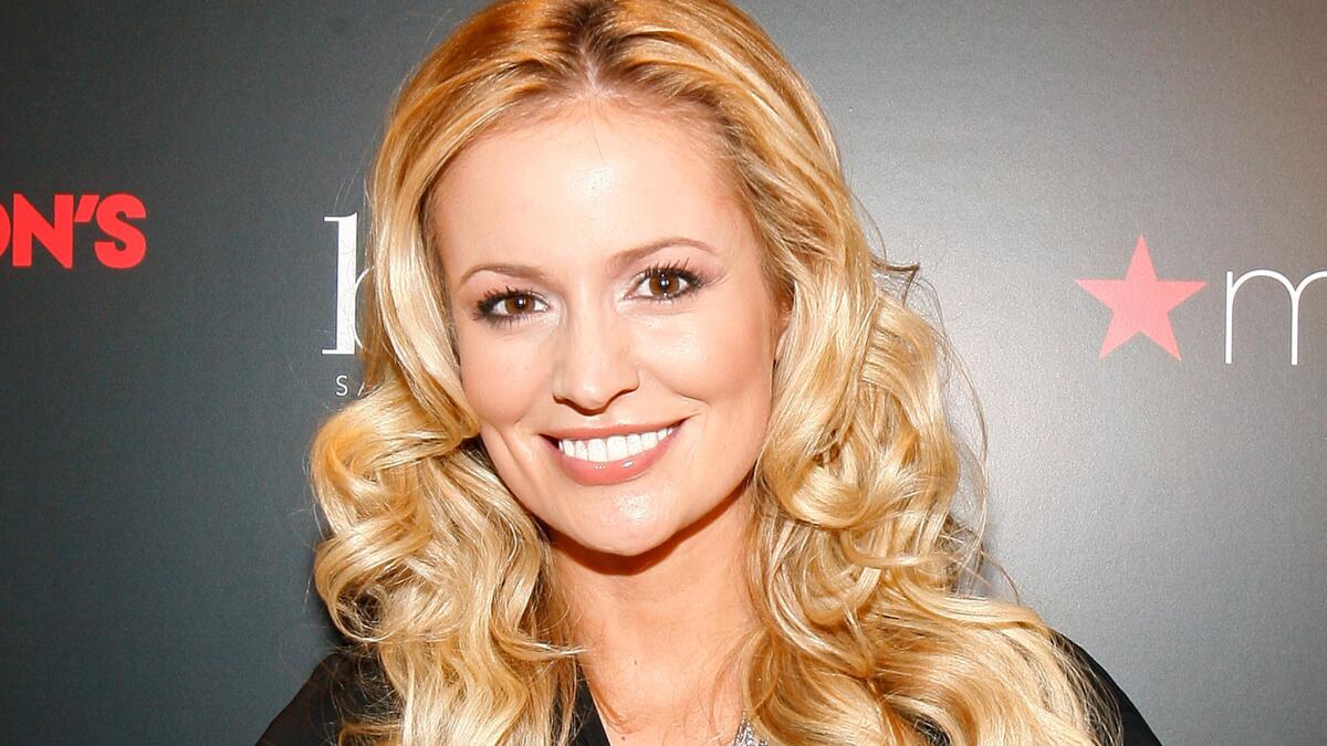 Emily Maynard of "Bachelor" and "Bachelorette" fame is expecting a baby with Tyler Johnson, her first husband and fourth fiance.