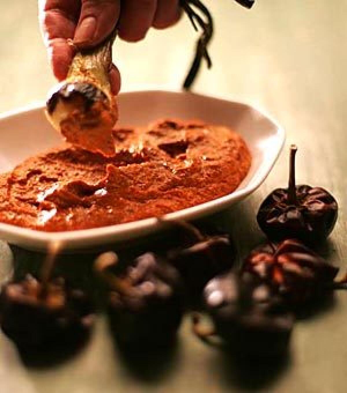 A classic version or romesco sauce showcases the delicate notes of the nuts and a sweet Spanish paprika.