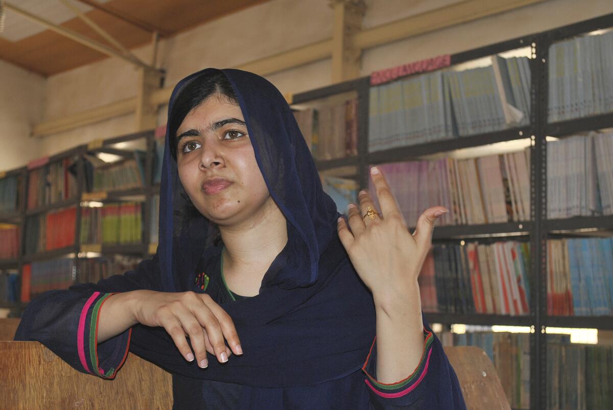 Nobel Peace laureate Malala Yousafzai visits a school in Maiduguri, Nigeria, on July 18.