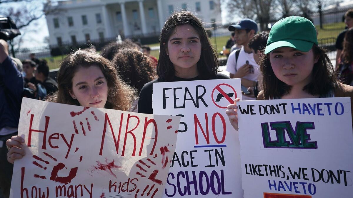 Students from the Washington area participate in a protest against gun violence outside the White House on Feb. 21.